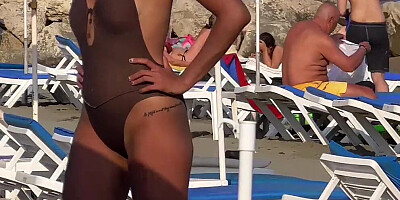 Girls with perfect bodies enjoy their day at the beach