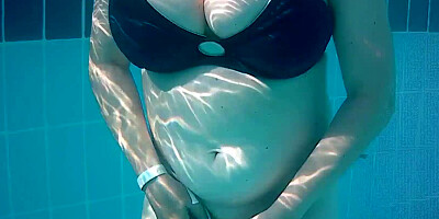 Naughty mature MILF MariaOld with big natural tits shows pussy in the swimming pool