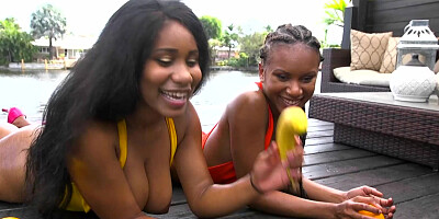 Two attractive black lesbians bounce their delicious butts and go back to back