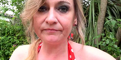 Horny mature woman gets horny and masturbates in the garden