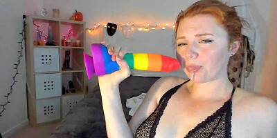 Ginger webcam girl is playing with sex toys for her horny fans