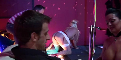 Strip club celebrates by having Christmas themed anal group sex with the blonde and brunette milfs