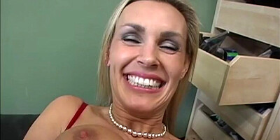 Busty MILF Tanya Tate poses in sexy lingerie and plays with herself