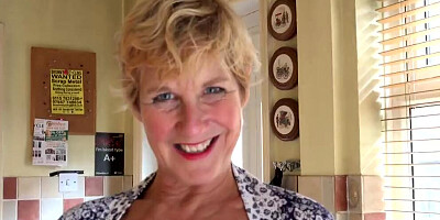 Short-haired mature woman is being naughty in this POV video