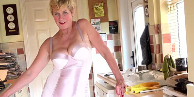 Short-haired mature woman is being naughty in this POV video