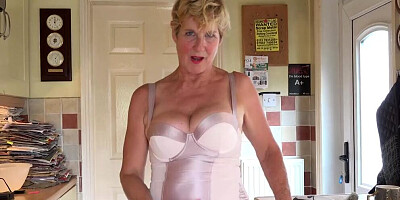 Short-haired mature woman is being naughty in this POV video