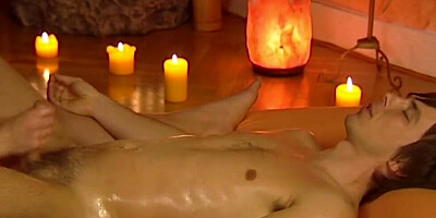Redhead masseuse massages dude's dick and balls until happy ending
