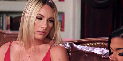 Two naughty MILFs are licking sexy feet on the couch