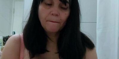 Chubby stepmom is filming herself while rubbing her big nipples