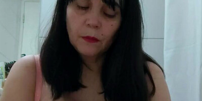 Chubby stepmom is filming herself while rubbing her big nipples