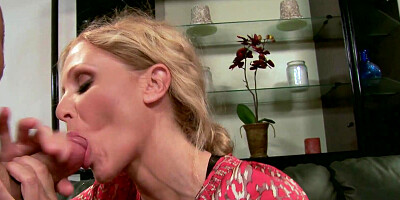 Cock-hungry MILF Julia Ann kneels between two guys and blows them