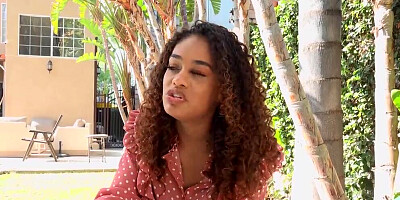 Curly haired girl Scarlit Scandal blows and rides a cock outside