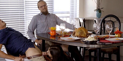 Slutty girl goes under the table to blow that man on the lunch