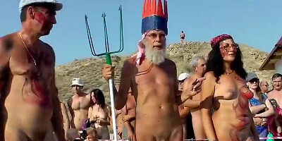 Naked women and men are having fun at Neptune nudist beach