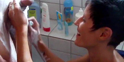Mature lady is giving a thorough blowjob in the bathroom