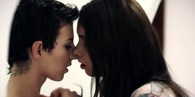 Cute lesbian licks her girlfriend's big natural tits and pussy