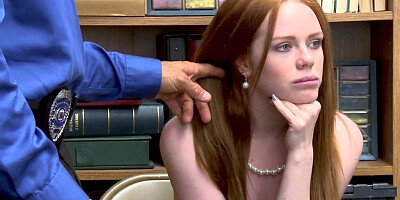 Redhead babe is giving a blowjob and banging a mall cop in a warehouse