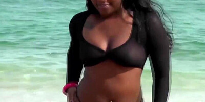 Ebony girl is fucking with a white guy she just met on the beach