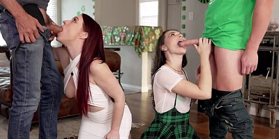 Two naughty brunettes are jumping on cocks in this 4some