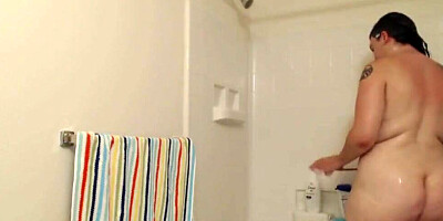 Chubby mom is being secretly filmed while taking a shower