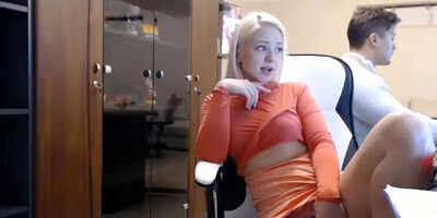 Webcam blonde is taking a break from work to masturbate and finger her cunny