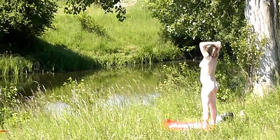 Voyeur is secretly filming Messalina Valeria while she's sunbathing naked