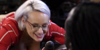 A big black cock is penetrating full-bosomed blonde MILF