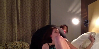 Amateur couple is filming one of their porn videos in a hotel room