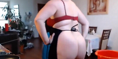 Busty mature shakes her big tits and rubs cunt on the camera