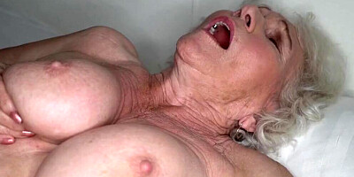 Slutty grandma and a horny guy are having sex in the bedroom