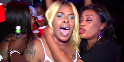 Drunk chubby girls are kissing and making out at the party