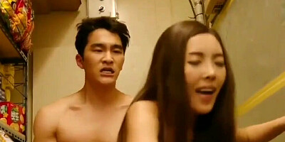 Asian chick is pressed against the wall and fucked from behind