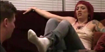This kinky dude is worshipping redhead girl's feet and toes