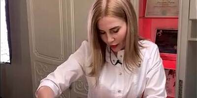 Blonde girl is touching man's dick while giving him depilation
