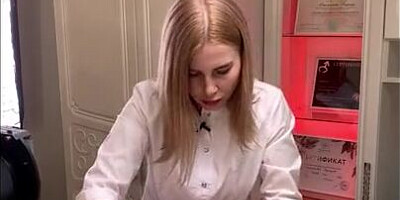 Blonde girl is touching man's dick while giving him depilation