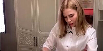 Blonde girl is touching man's dick while giving him depilation