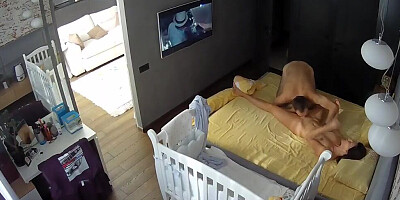 A hidden cam in the apartment films as this couple is fucking