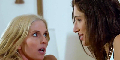 Splendid brunette and blonde are making out and licking one another