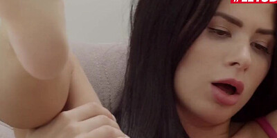 Brunette teen is enjoying solo masturbation while watching porn flicks
