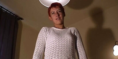 Short-haired girl gets naked and plays with her pussy