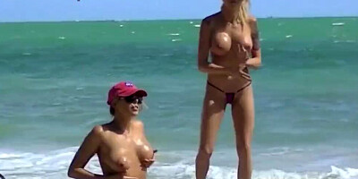 Exhibitionist babes Nikki Brooks & Violet Skye are masturbating on a beach