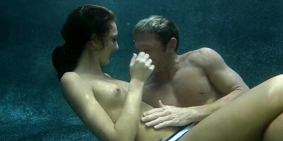 Young beauty with small tits had intense sex underwater