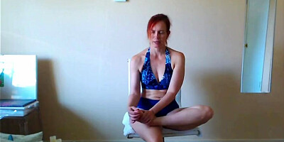 Redheaded MILF enjoy in some yoga in front of the cam