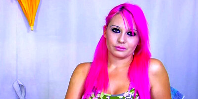 A busty pink haired babe from Germany gets her face sprayed with warm cum