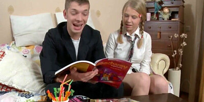 Cute schoolgirl goes down on classmate to suck his cock