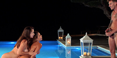 Beautiful babes fingering before publicly fucking in threesome with a horny stud at the pool