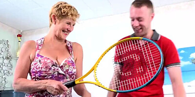 Mature woman blows her tennis instructor and gets fucked from behind