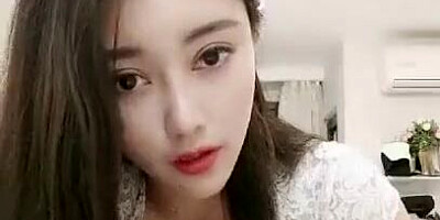 Sweet Asian camgirl loves teasing horny guys over the sex chat