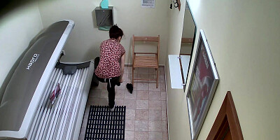 Shaved and Tight Pussy Caught in Solarium