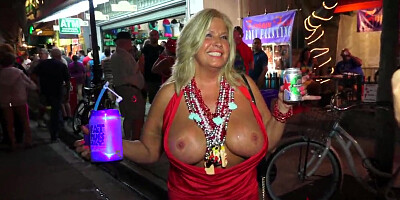 Cheerful women flash beautiful boobs in the street